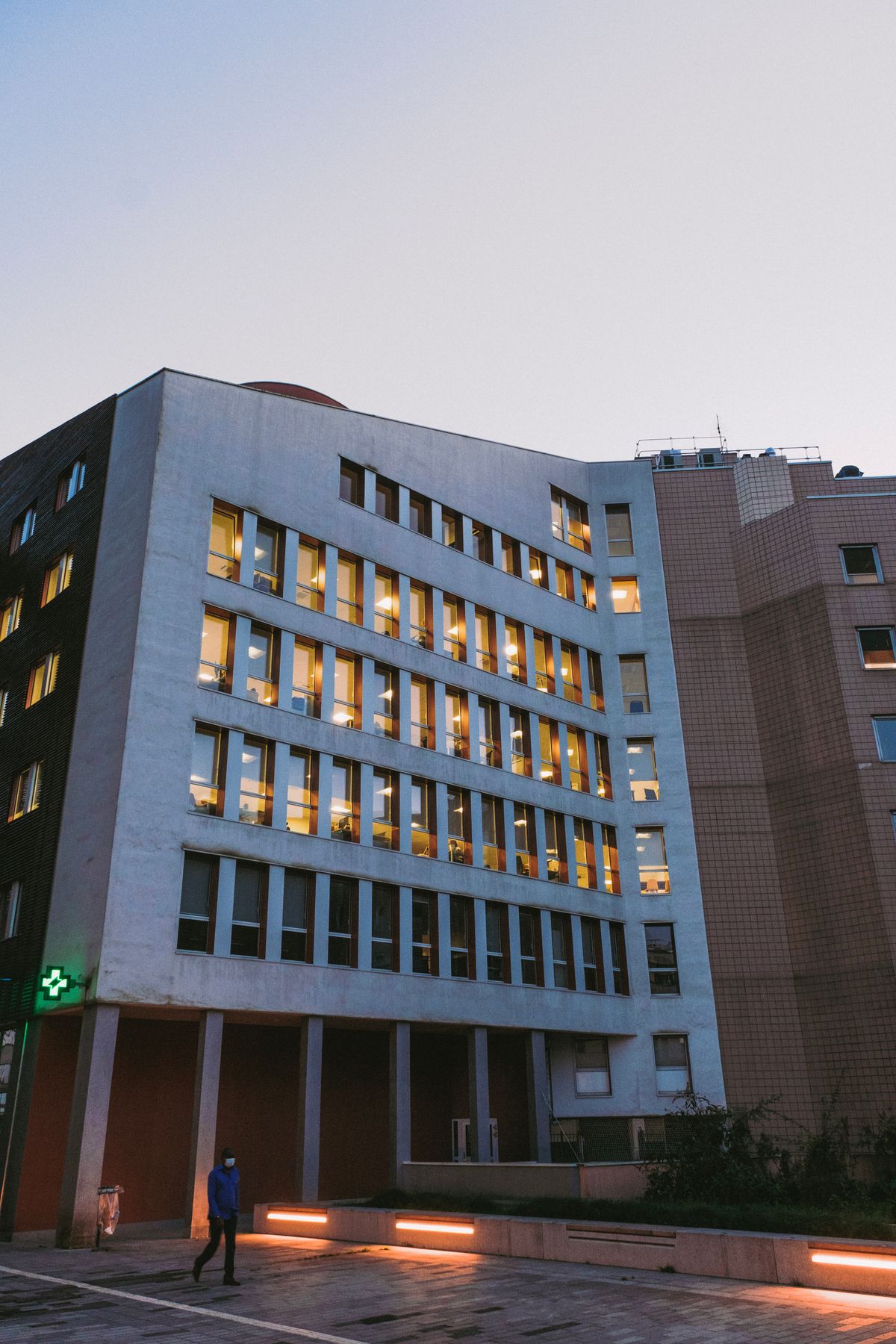 Sample photograph of a medical building exterior at dusk.